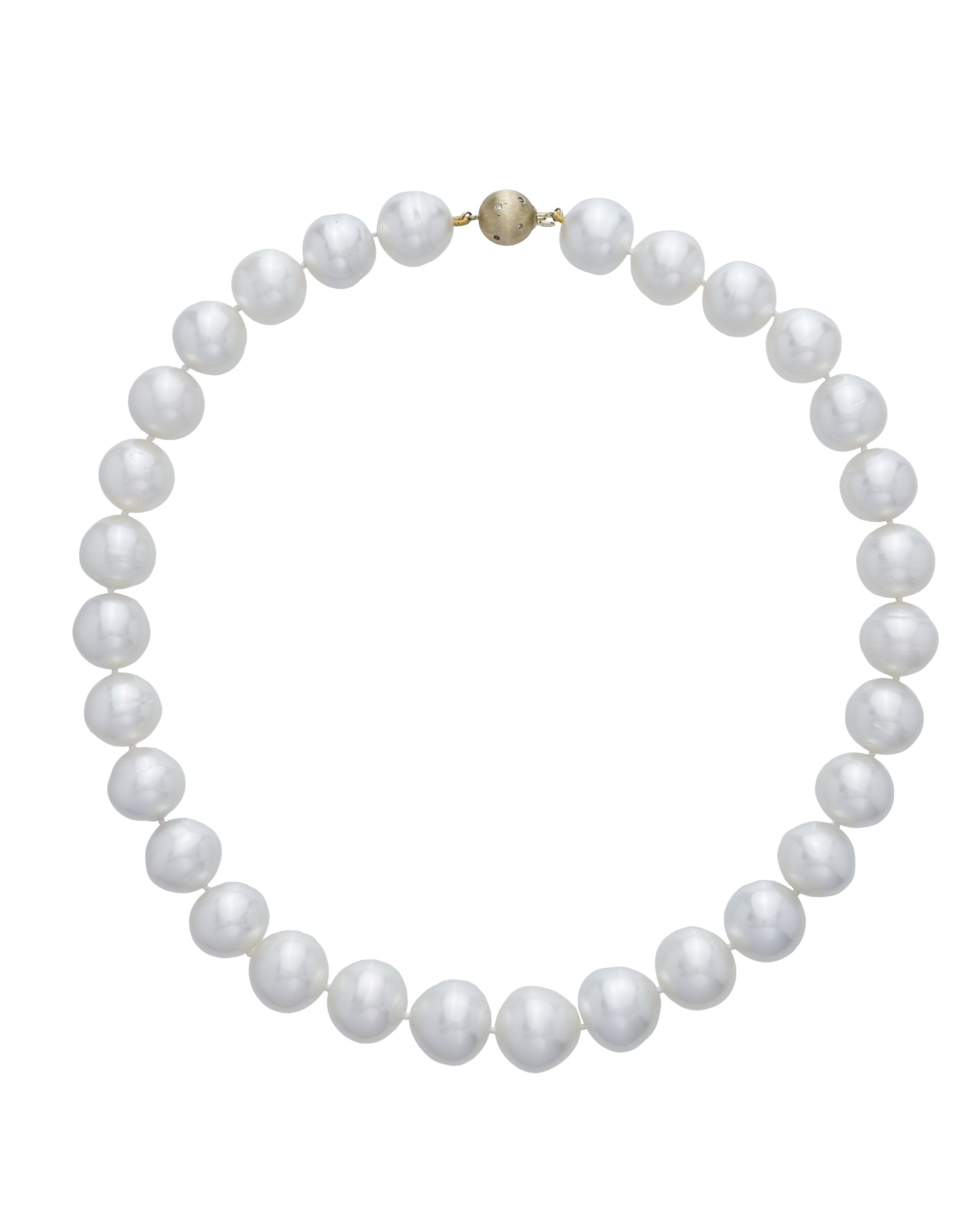 Australian South Sea pearl strand featuring a diamond set clasp, crafted in 18 karat yellow gold.