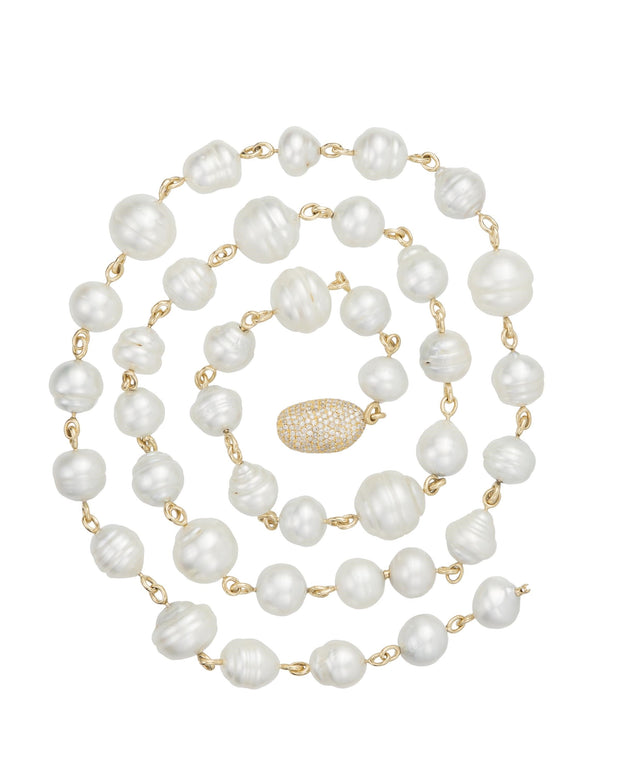 Gold South Sea pearl necklace featuring grey white and golden tone Australian baroque pearls and pave diamond 'pebble' set with diamonds, crafted in 18 karat yellow gold.