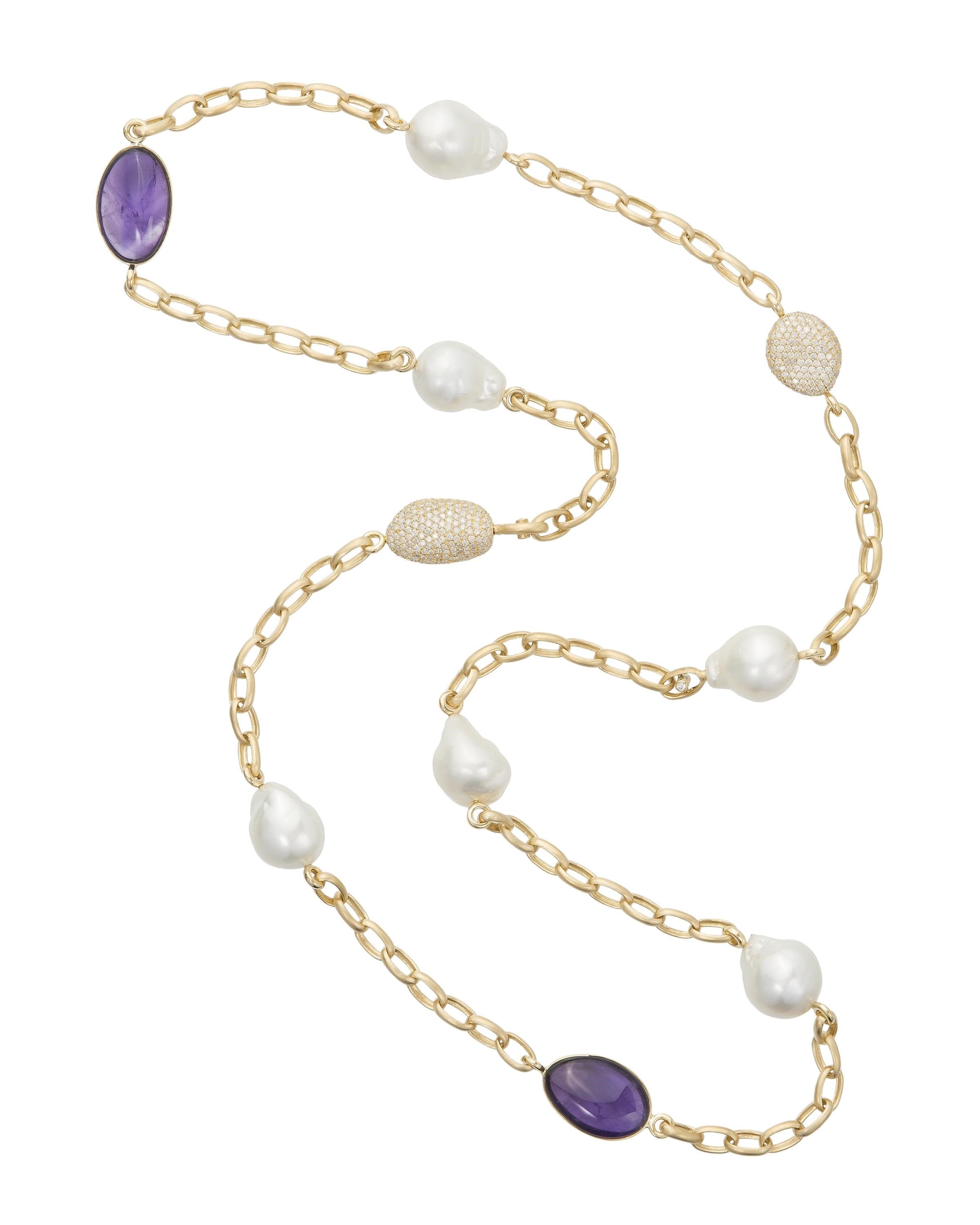 South Sea pearl, diamond and amethyst necklace featuring Australian baroque South Sea pearls, amethyst 'pebbles' and diamond 'pebbles' set with diamonds, crafted in 18 karat yellow gold.