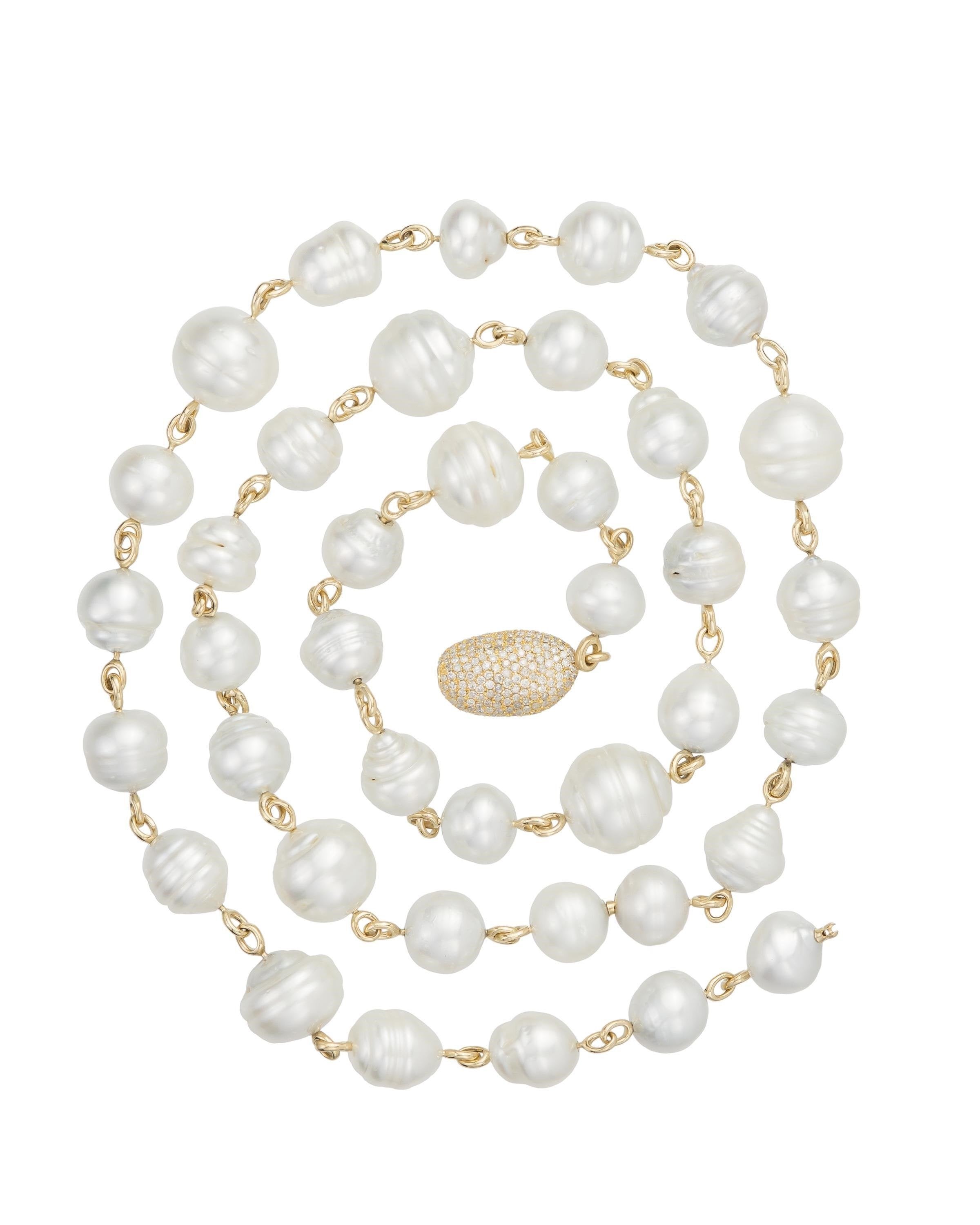 South Sea pearl and diamond pebble necklace, crafted in 18 karat yellow gold chain.