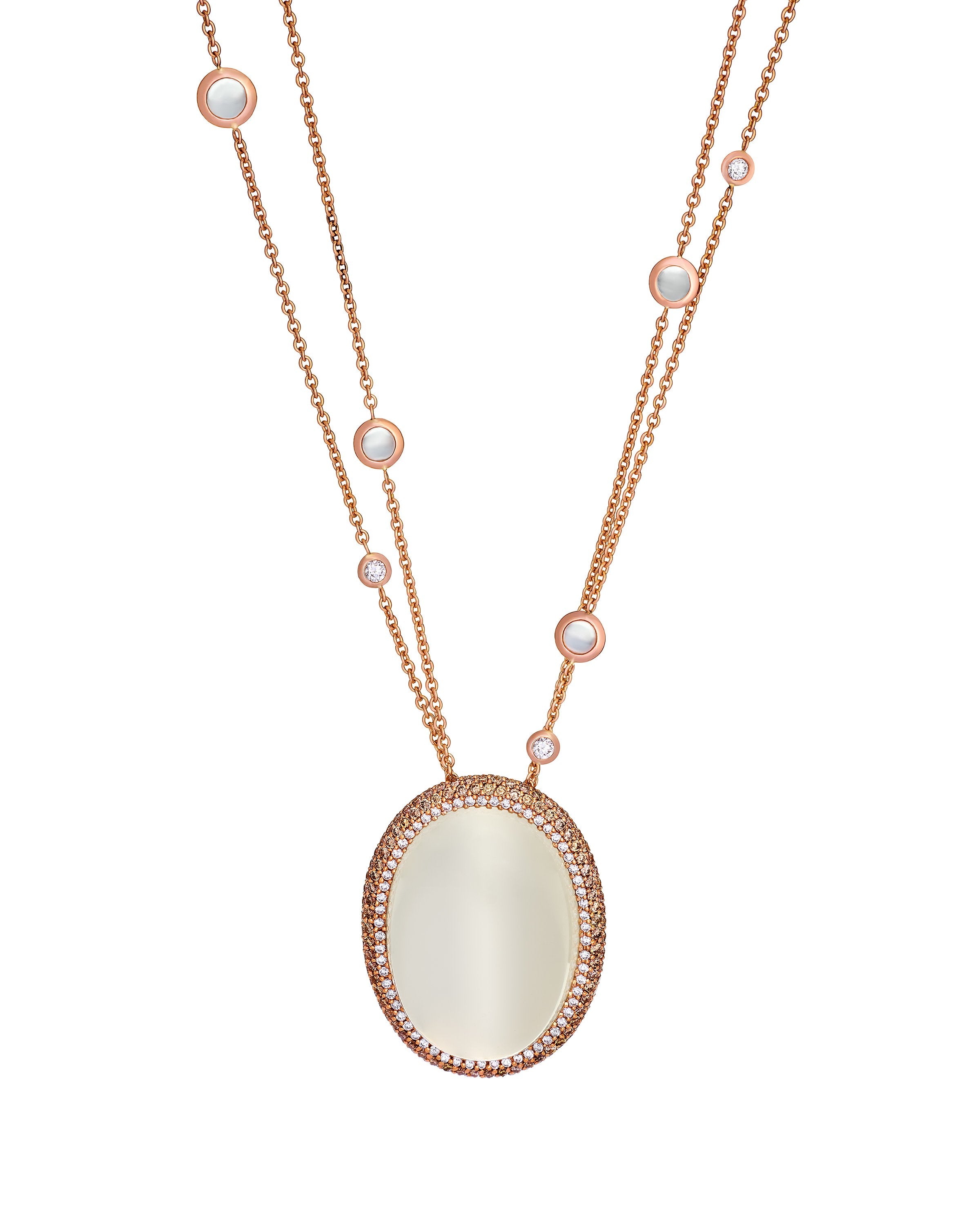 Moonstone pendant surrounded by diamonds, dropping from an 18 karat rose gold chain with diamonds and moonstones.