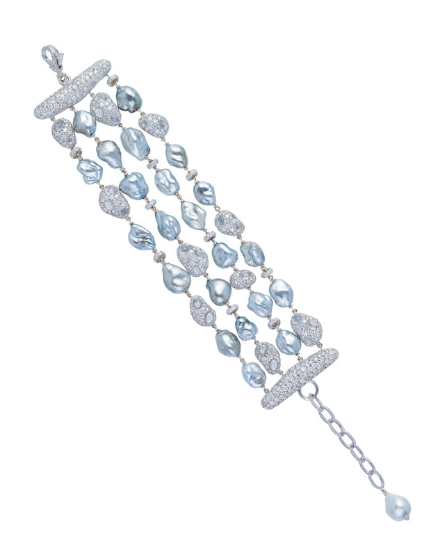 Tahitian Keshi pearl bracelet featuring diamonds and cabochon white moonstones, crafted in 18 karat white gold.