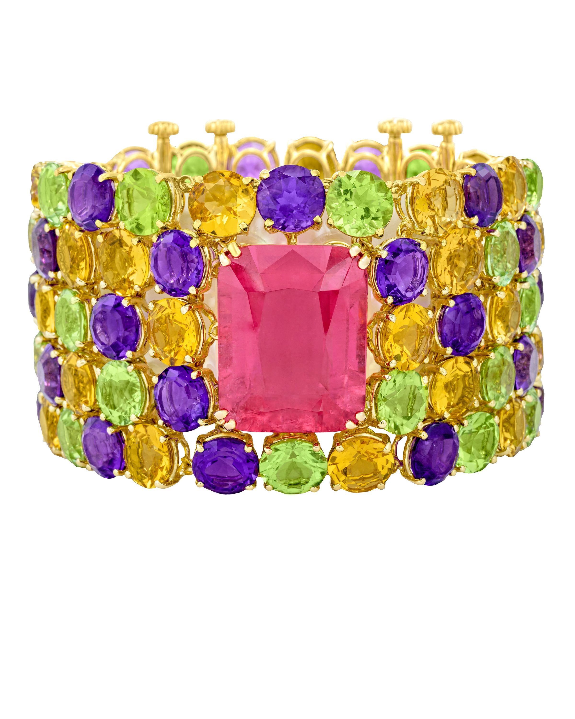 "Tutti Frutti" cuff featuring a center NYC rubellite, with yellow beryl, amethyst and peridot, crafted in 18 karat yellow gold.