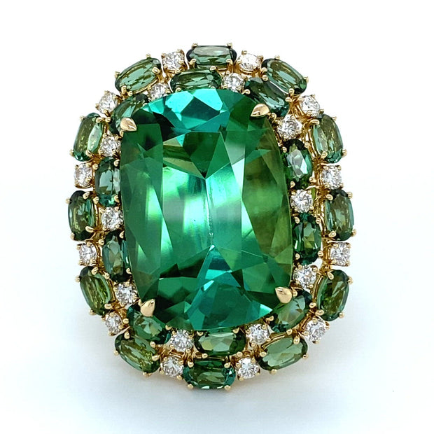 Green tourmaline ring, crafted in 18 karat yellow gold.